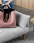 Musk neoprene bag on couch