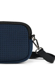 Small navy blue neoprene cross body bag close up