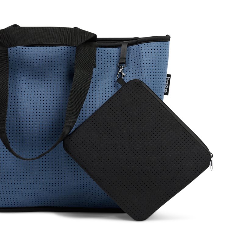 Neoprene bag in blue with double straps and attachements