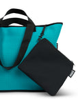 Neoprene bag in teal with double straps and attachements