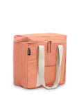 Peach coloured cooler bag with white straps
